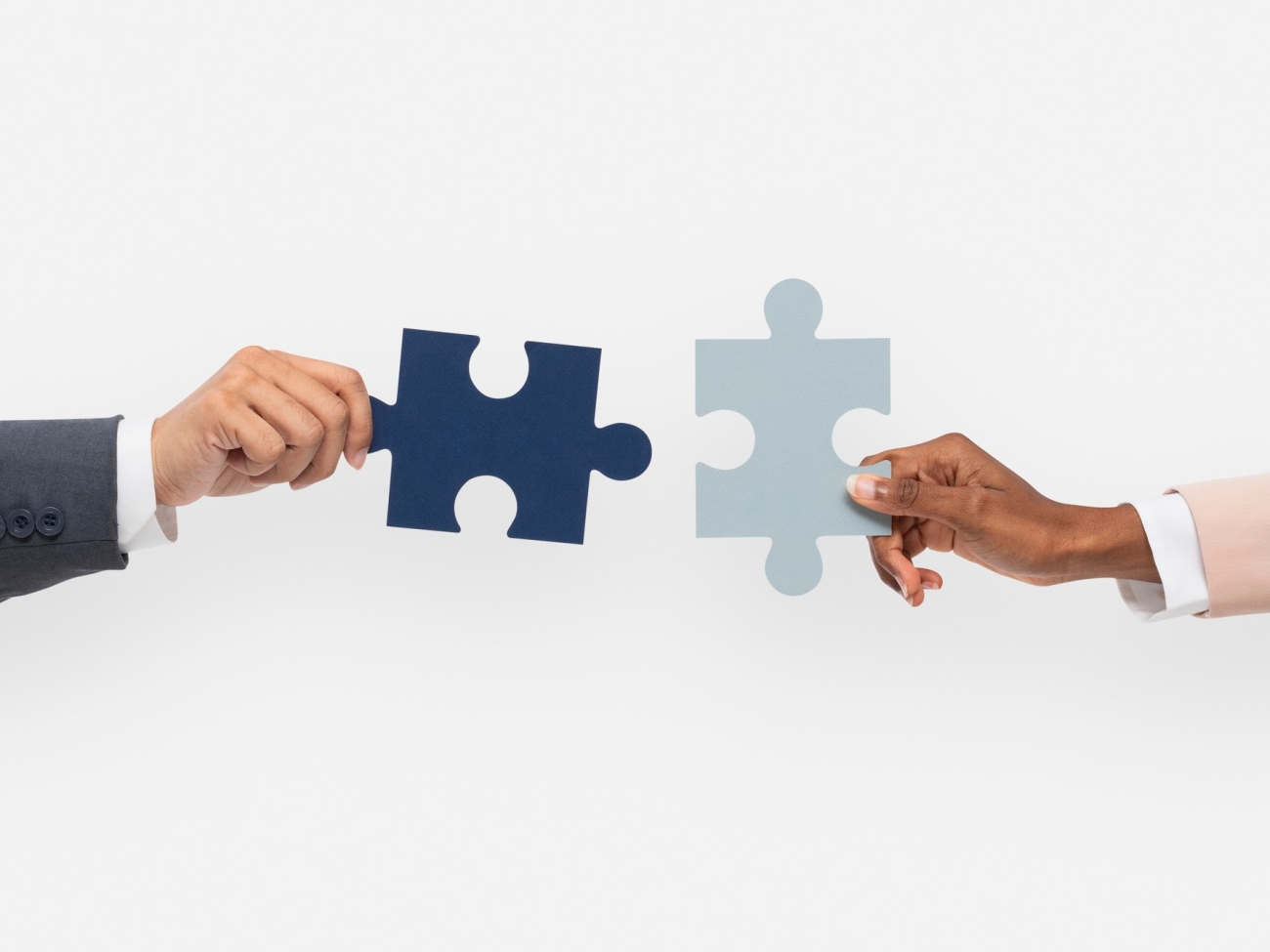hands-holding-puzzle-business-problem-solving-concept