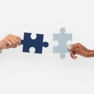 hands-holding-puzzle-business-problem-solving-concept