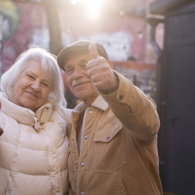 medium-shot-senior-people-showing-thumbs-up